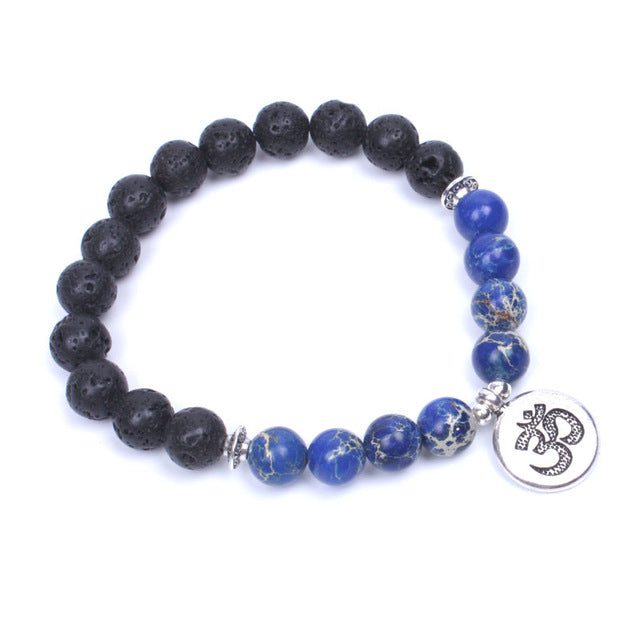 calming-lava-stone-om-charm-bracelet.jpg Calming Lava Stone Om Charm Bracelet - Image 1