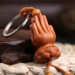 Peach Wood Namaskara Mudra Lotus Buddha Hand Key Ring